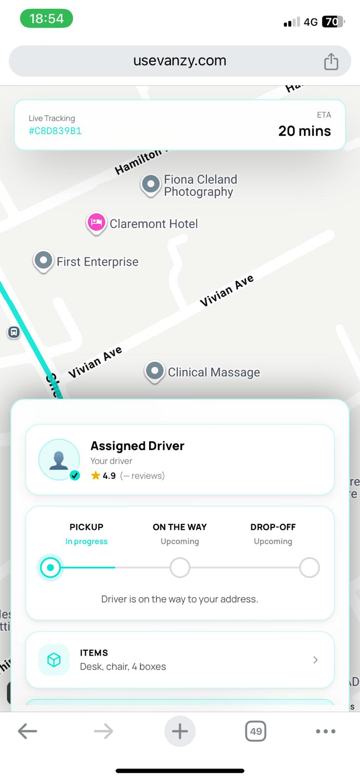 Vanzy tracking page showing the assigned driver on a live map with ETA and driver details